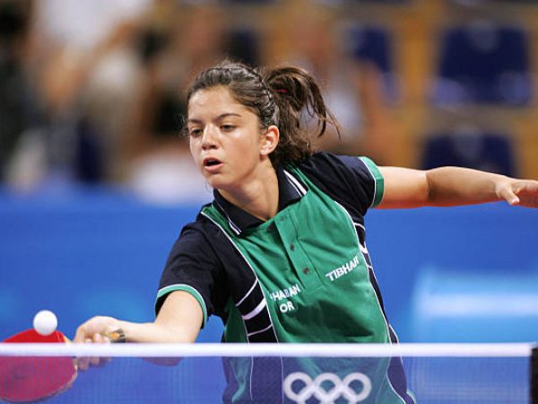 Athens, GREECE: Jordan's Zeina Shaban competes against Izzwa Medina of Honduras in their Olympic Games table tennis women's singles first round match, 15 August 2004, at the the summer games in Athens. Shaban won. AFP PHOTO / Ramzi HAIDAR (Photo credit should read RAMZI HAIDAR/AFP via Getty Images)